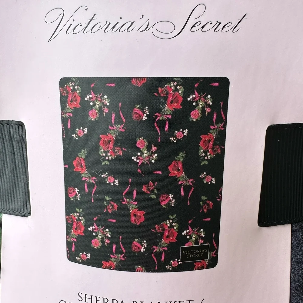 NEW Victoria’s Secret Sherpa Blanket 50”X 60” blk w/ red & pink flowers.
